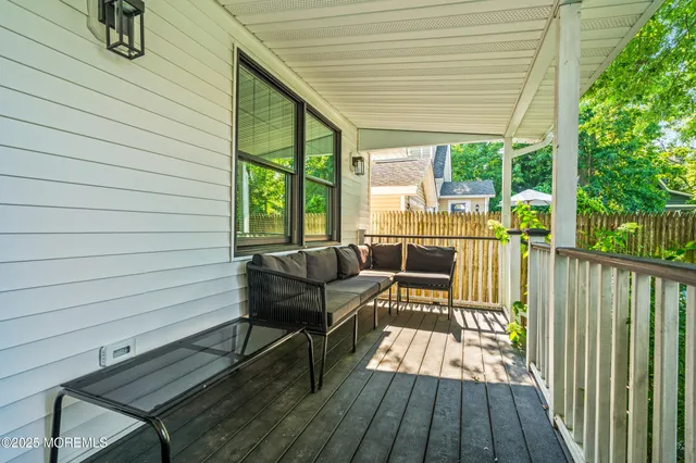 a view of a chairs on the roof deck