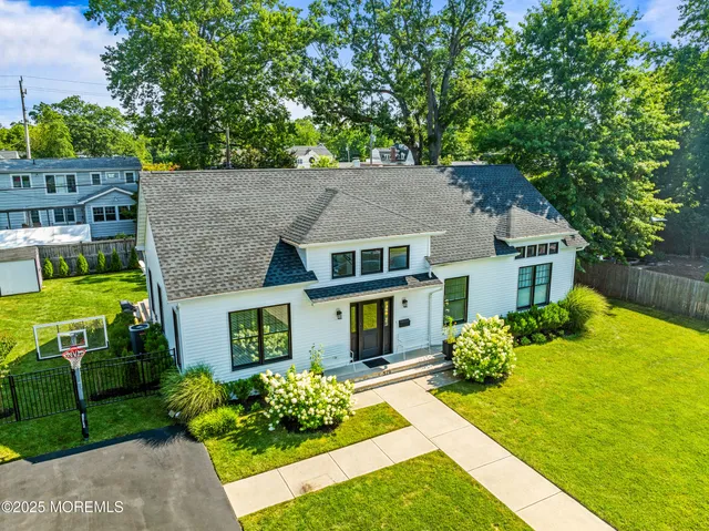 front view of house with a garden