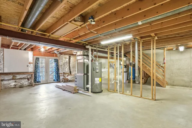a view of an empty room with a glass door