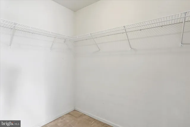 a view of workspace with window and a ceiling fan