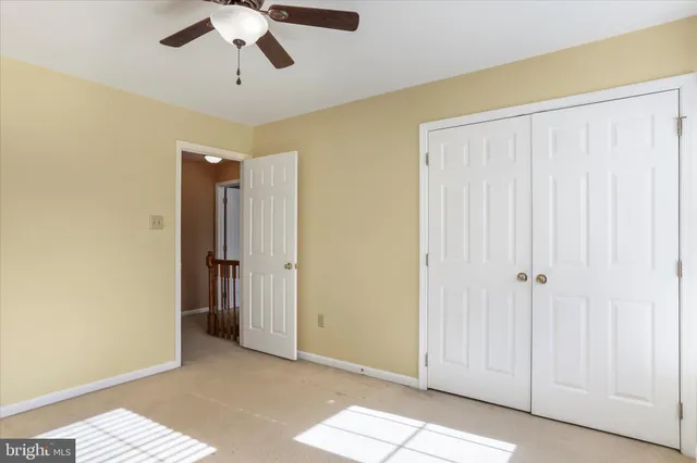 a view of empty room with windows