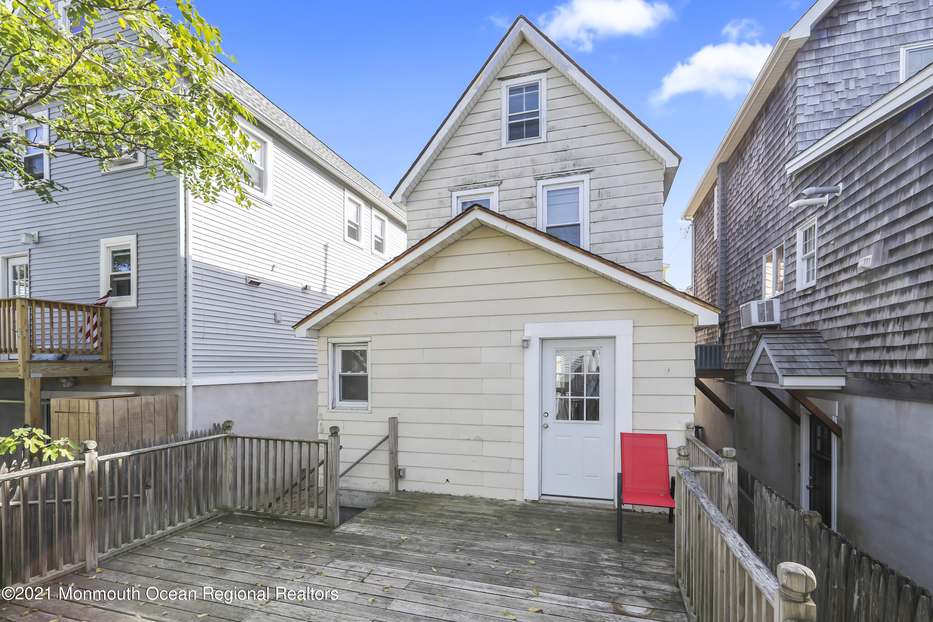 21 Center Street Sea Bright, NJ 07760 - Photo 14 of 21 a view of a house with wooden fence