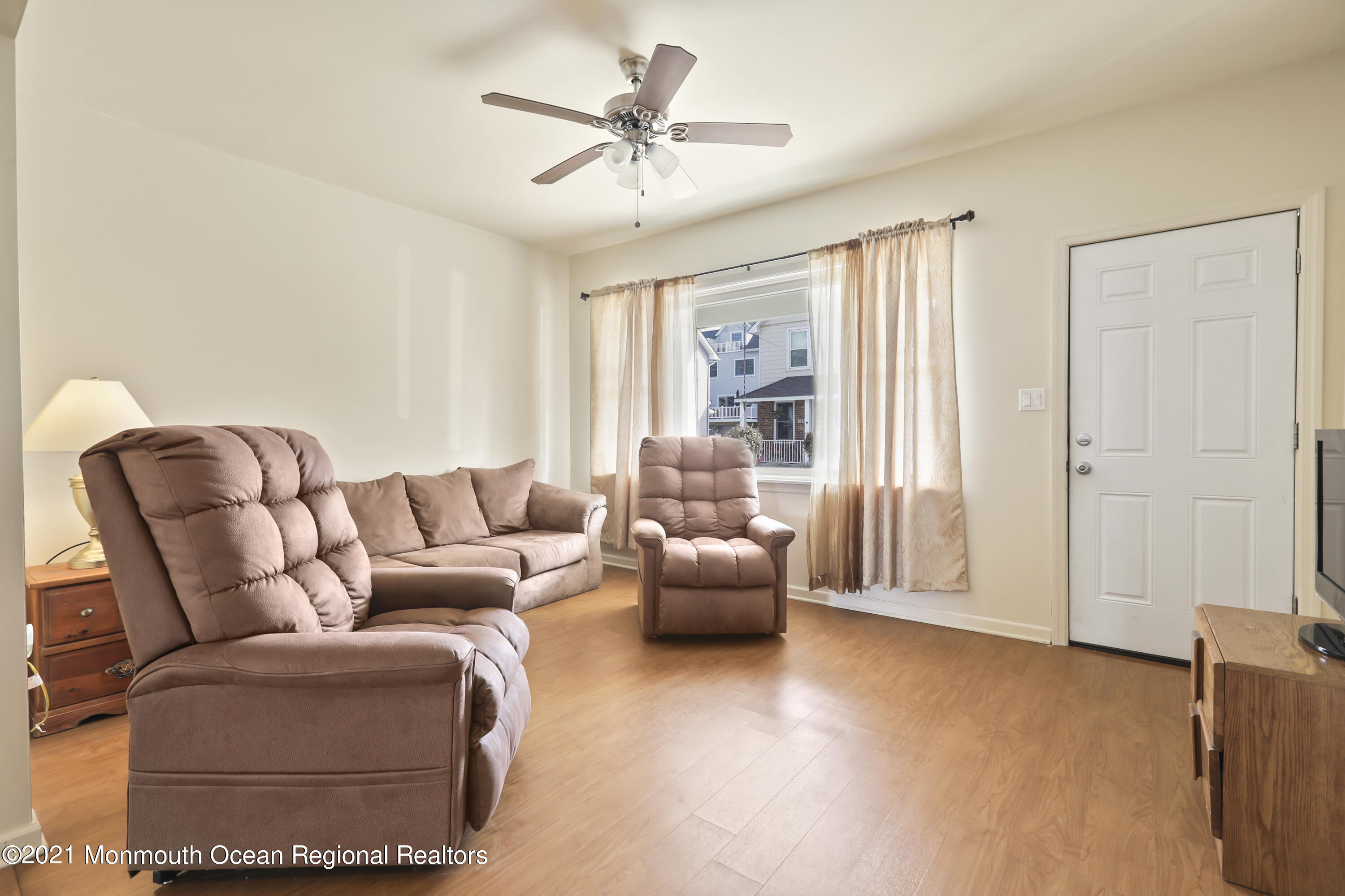 21 Center Street Sea Bright, NJ 07760 - Photo 2 of 21 a living room with furniture and a window