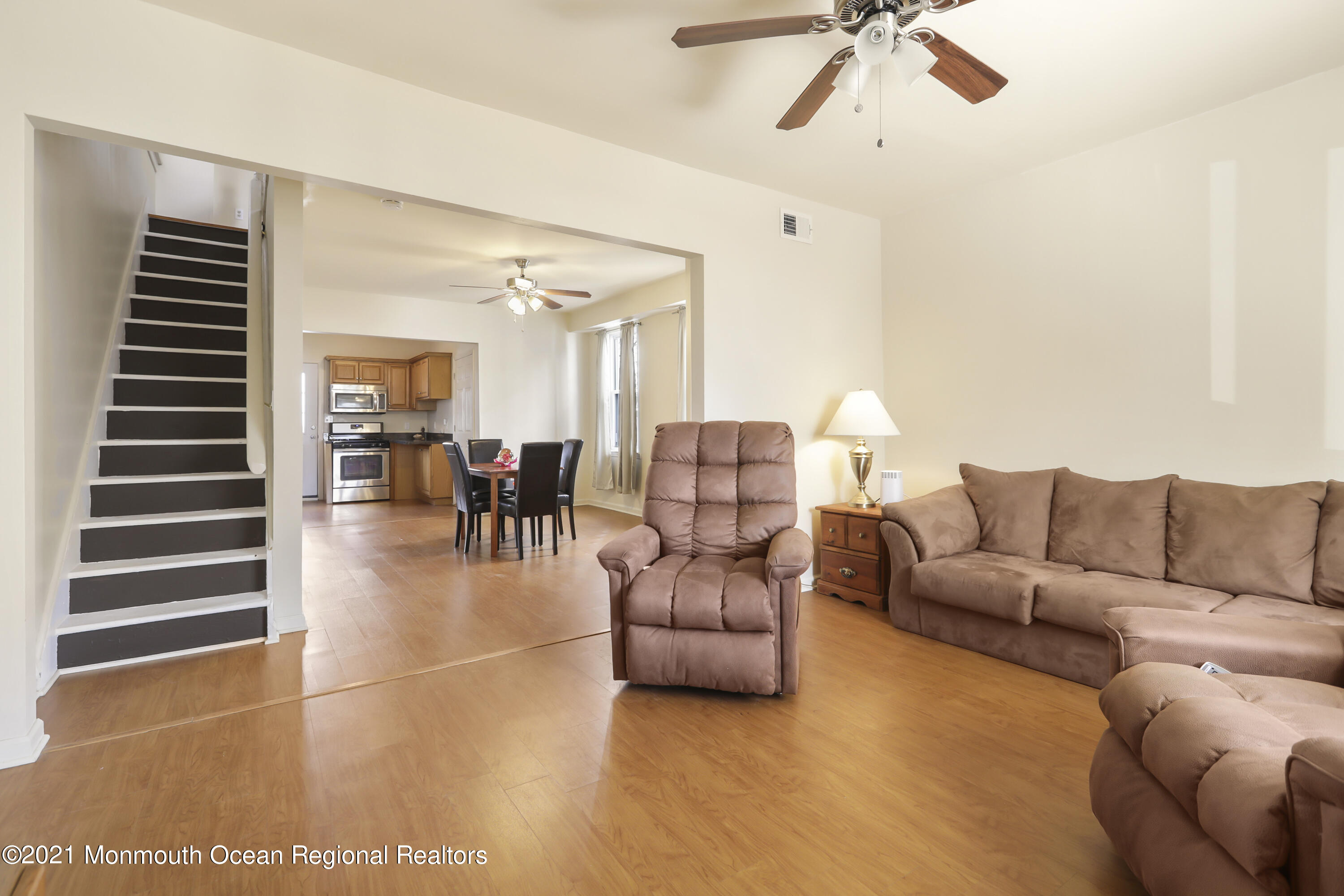 21 Center Street Sea Bright, NJ 07760 - Photo 3 of 21 a living room with furniture and a view of kitchen