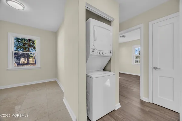 a room that has a window and a wooden floor