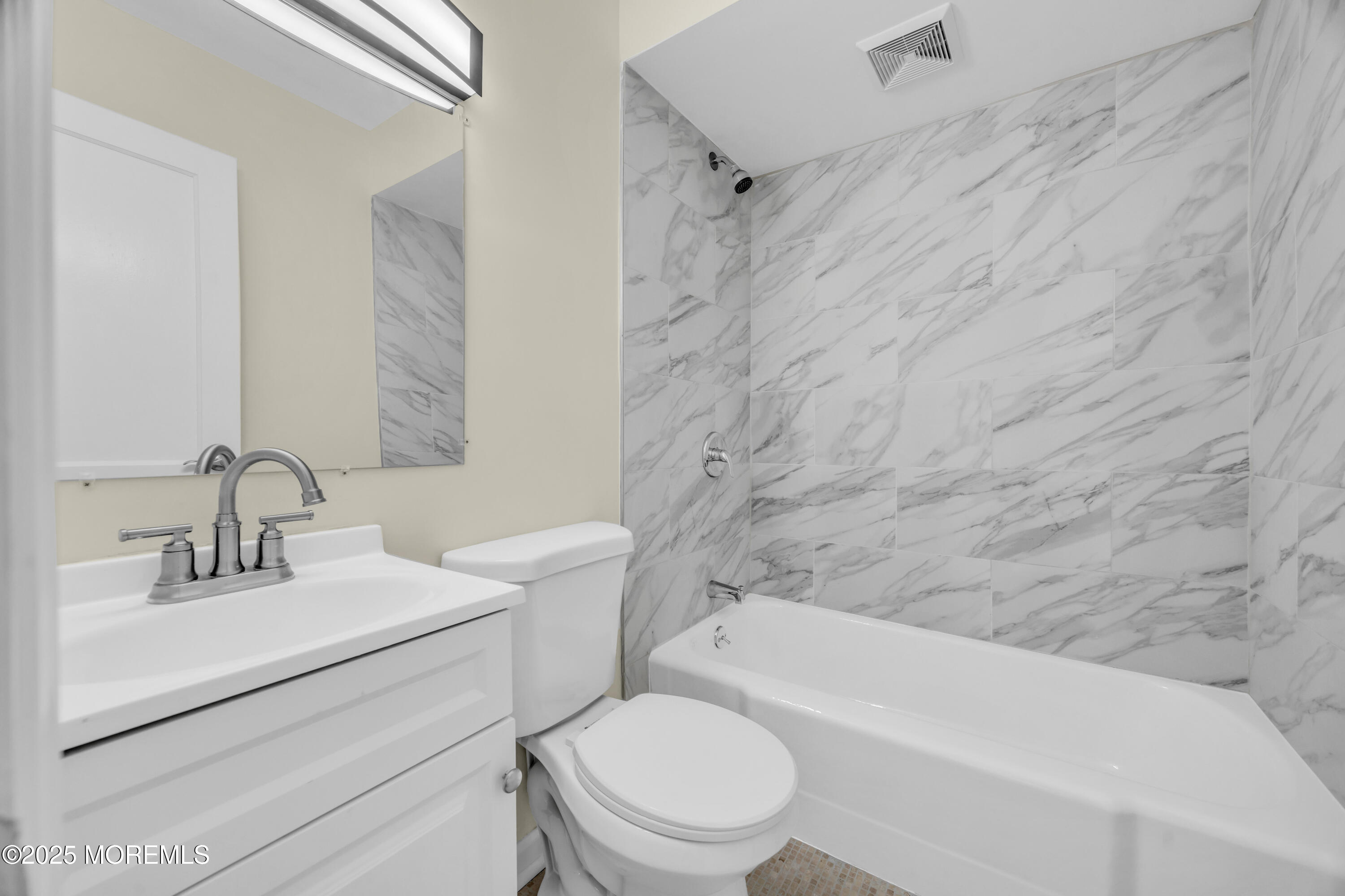 11 Randolphville Road Piscataway, NJ 08854 - Photo 15 of 27 a bathroom with a sink toilet and shower