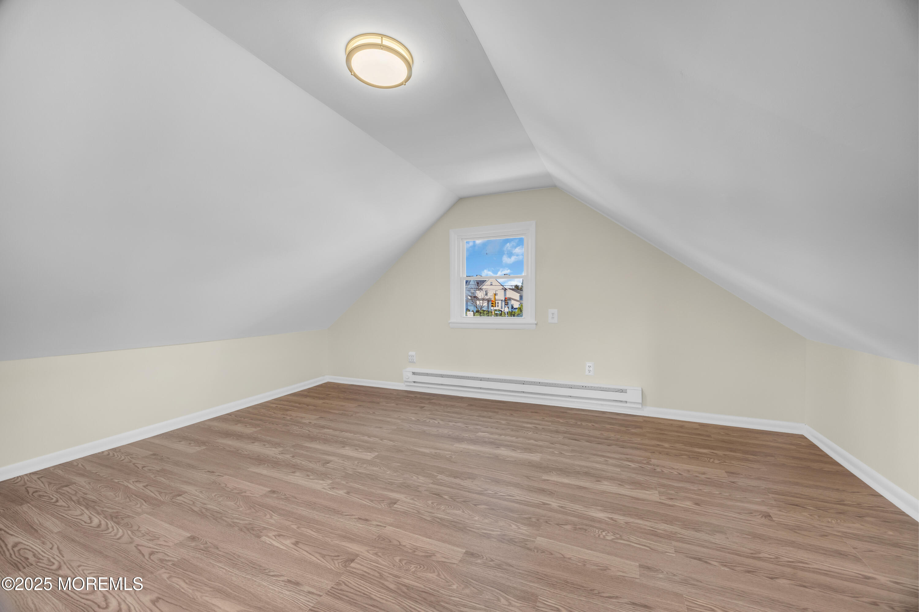 11 Randolphville Road Piscataway, NJ 08854 - Photo 18 of 27 an empty room with wooden floor and windows