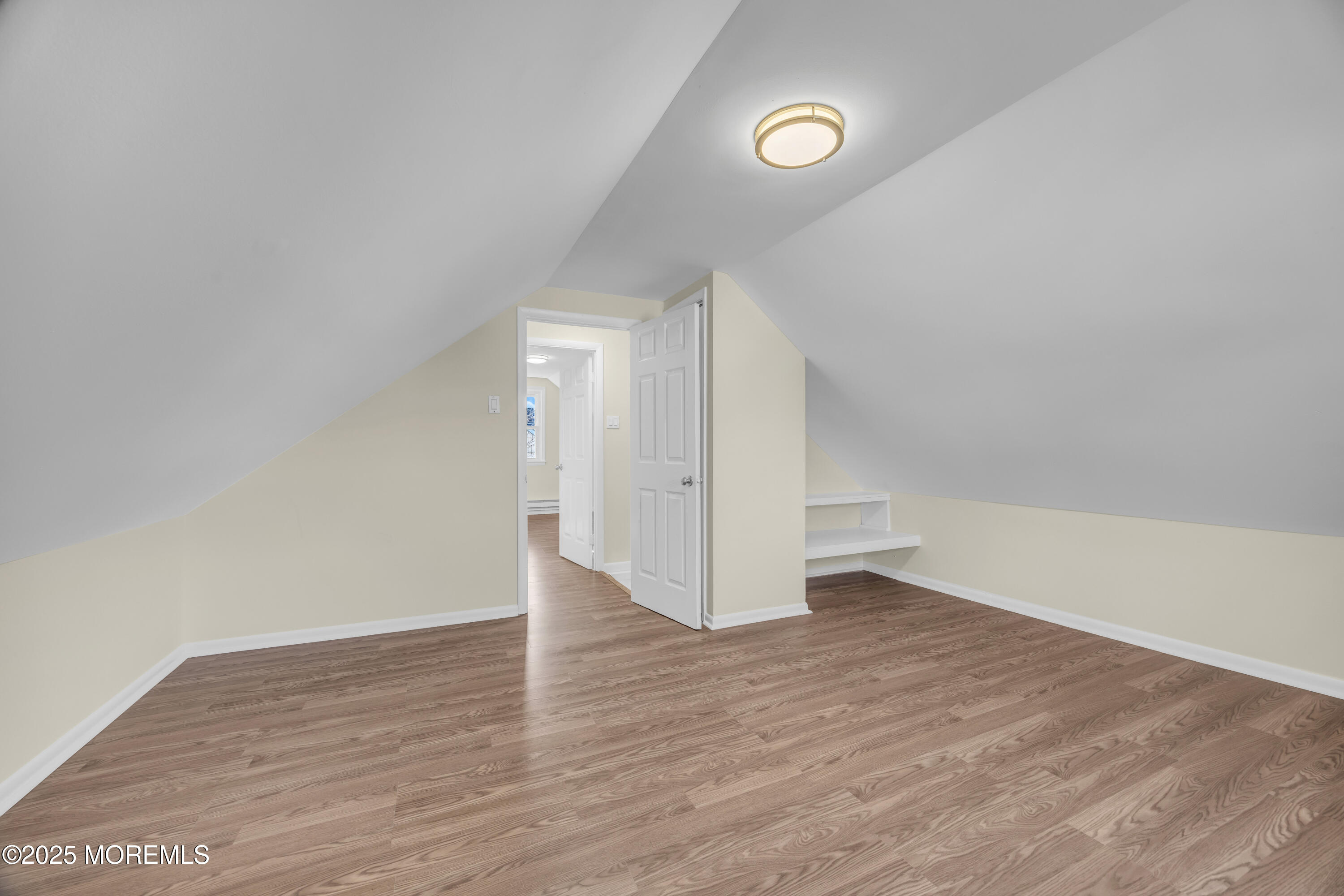 11 Randolphville Road Piscataway, NJ 08854 - Photo 19 of 27 a view of an empty room with wooden floor and closet
