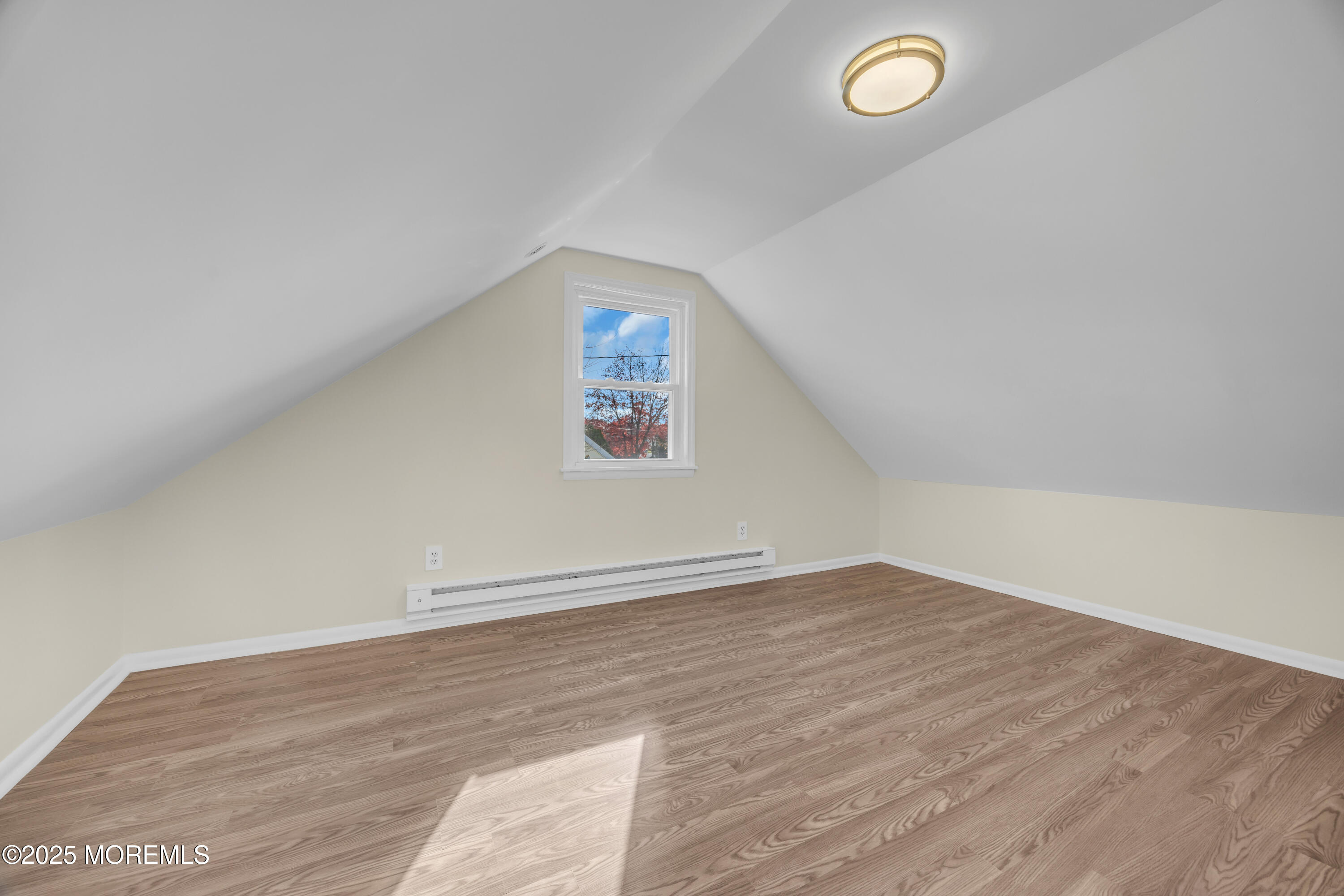 11 Randolphville Road Piscataway, NJ 08854 - Photo 20 of 27 an empty room with wooden floor and windows