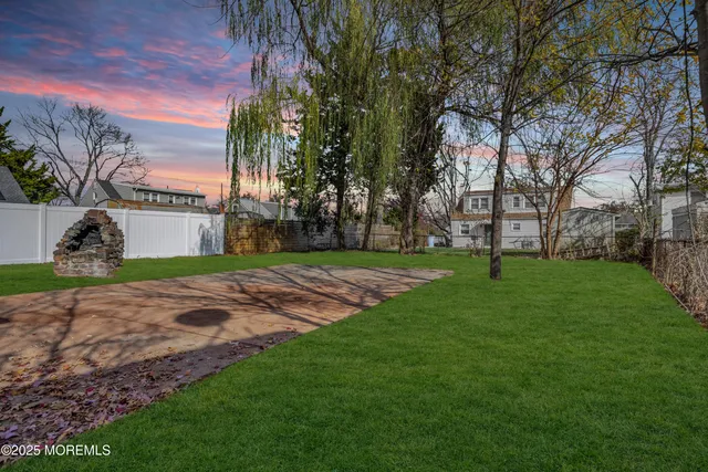 a view of a garden with an outdoor space