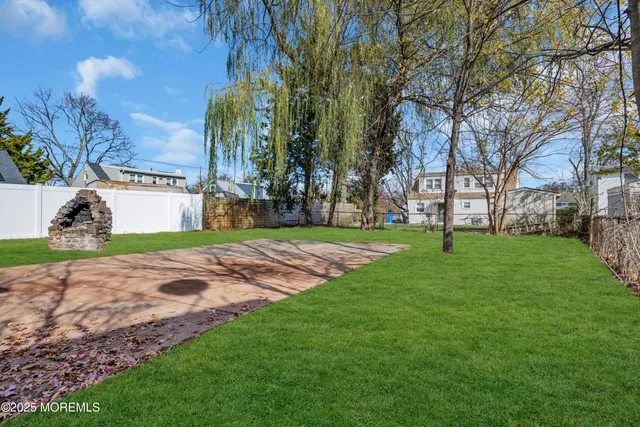 a house with yard in front of it