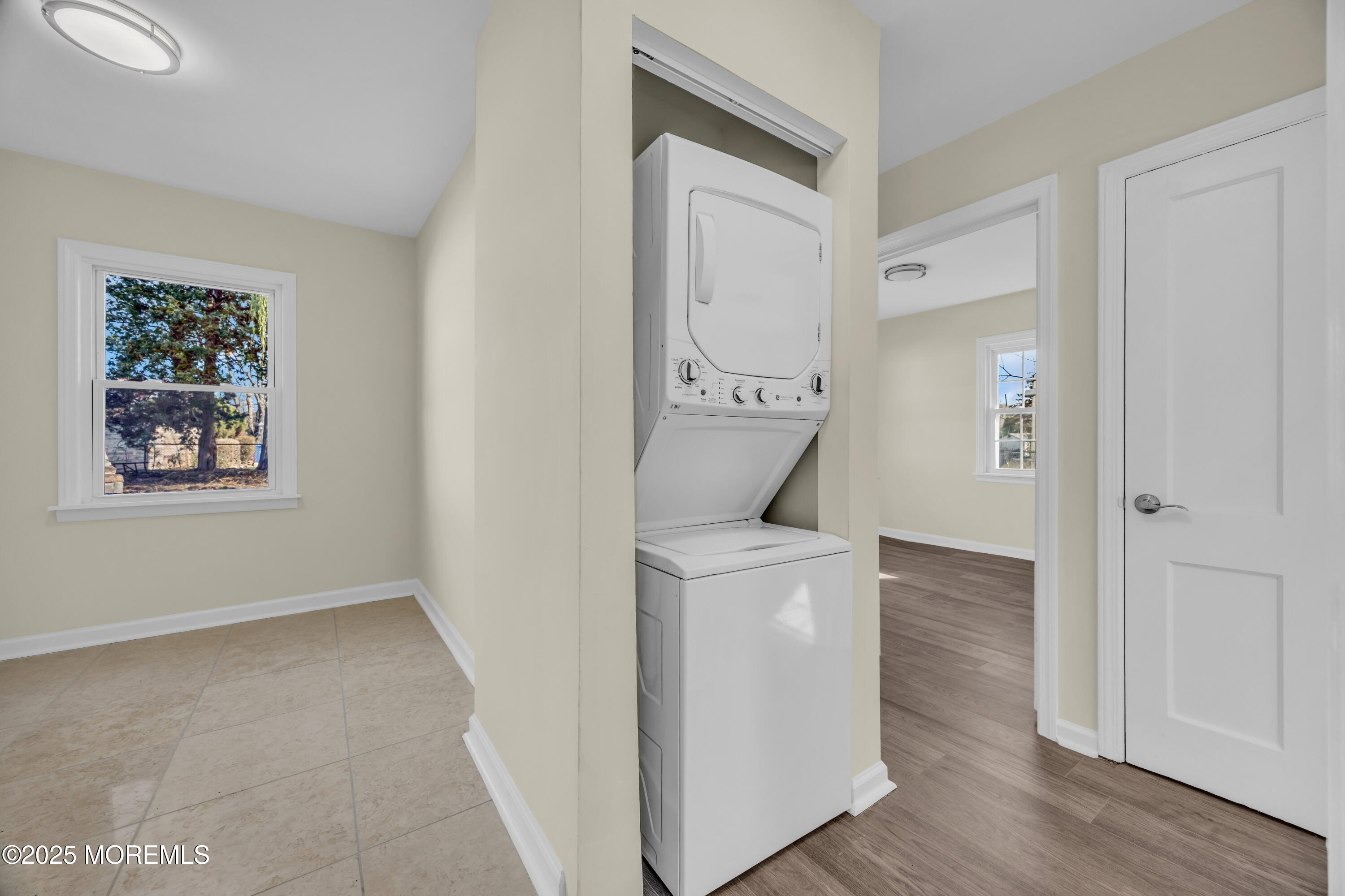 11 Randolphville Road Piscataway, NJ 08854 - Photo 10 of 27 a room that has a window and a wooden floor