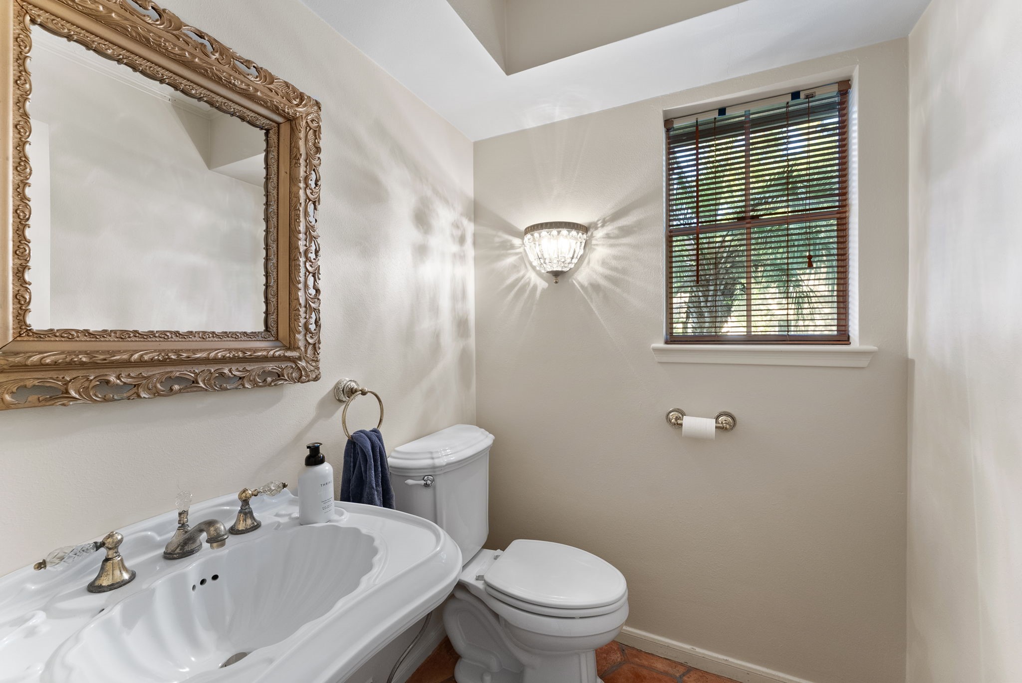 5718 Glenmere Lane Spring, TX 77379 - Photo 21 of 43 a bathroom with a sink mirror and toilet