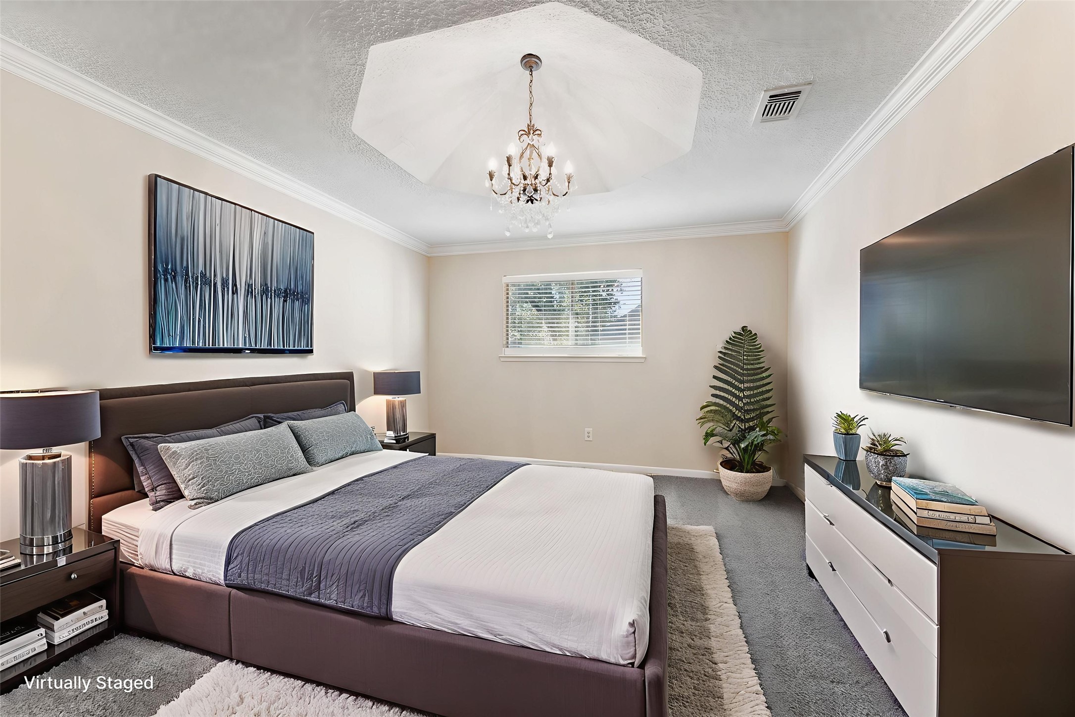 5718 Glenmere Lane Spring, TX 77379 - Photo 29 of 43 a bedroom with a bed and a flat screen tv