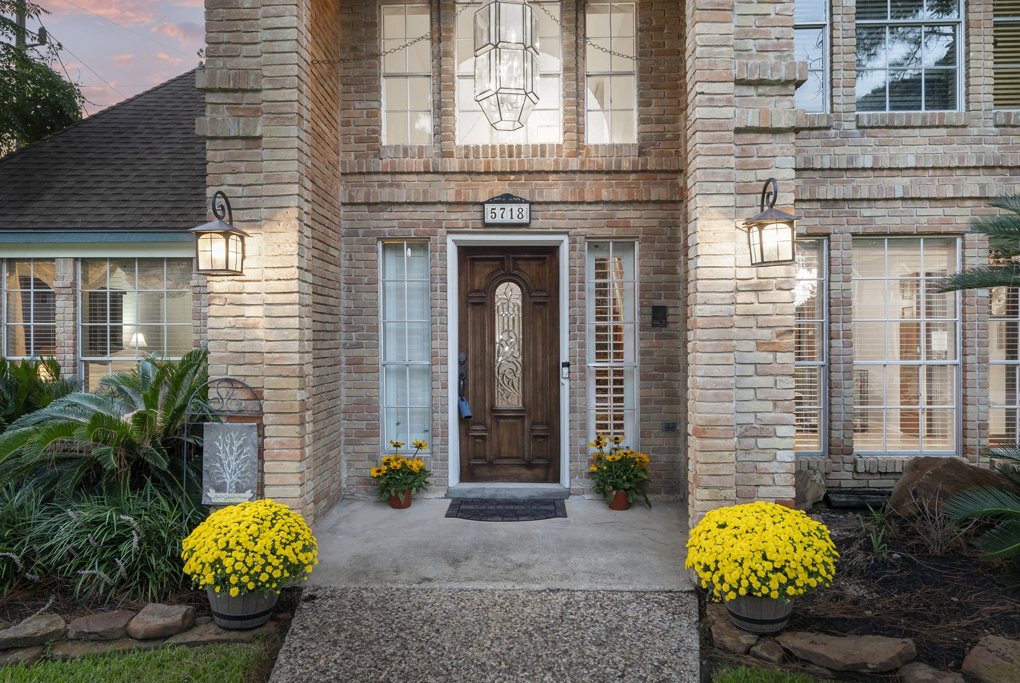 5718 Glenmere Lane Spring, TX 77379 - Photo 3 of 43 a front view of a house with outdoor seating