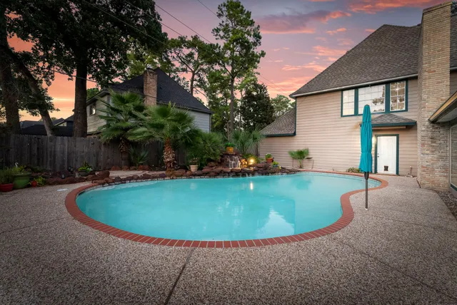 a view of a house with swimming pool