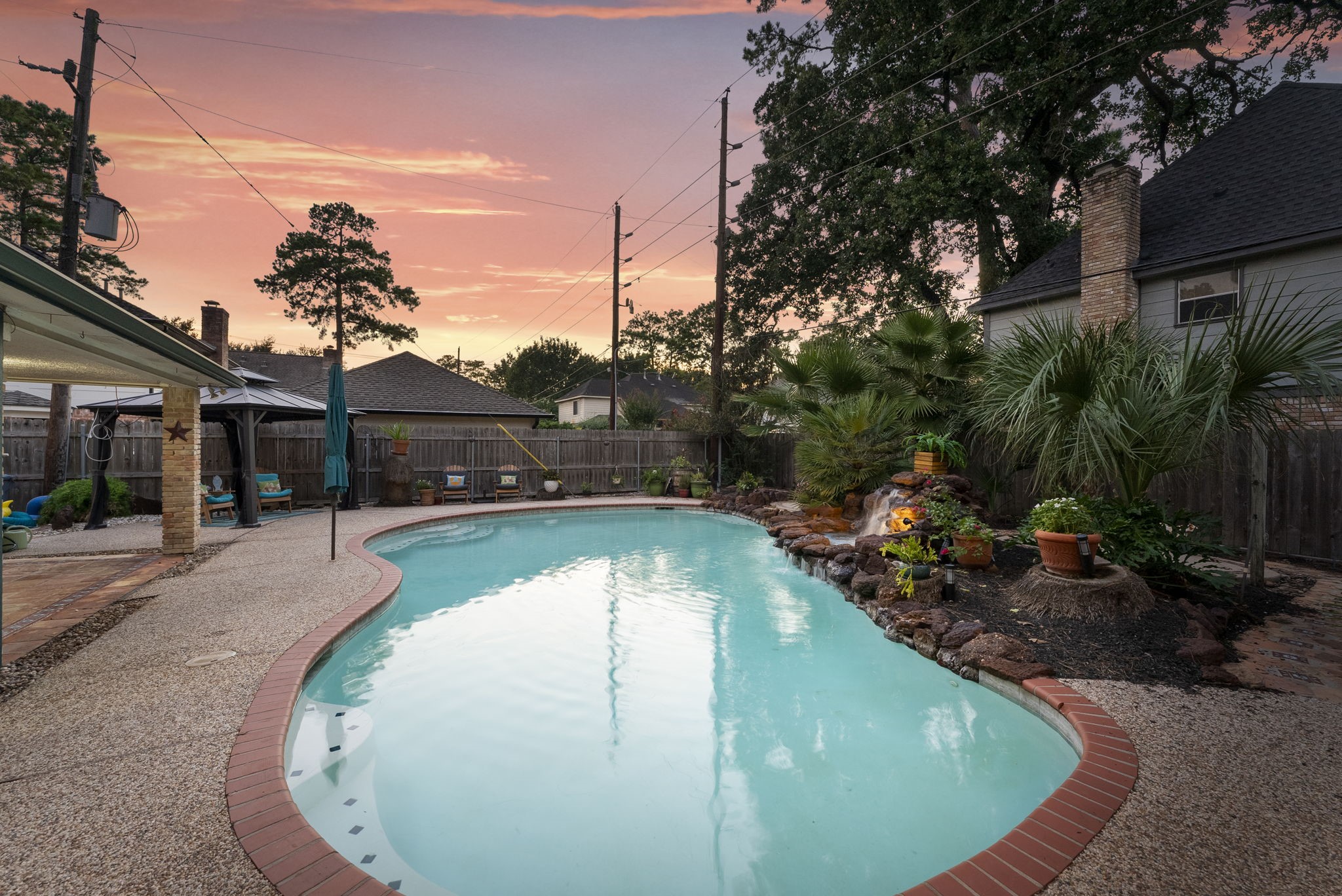 5718 Glenmere Lane Spring, TX 77379 - Photo 39 of 43 a view of a swimming pool with a patio