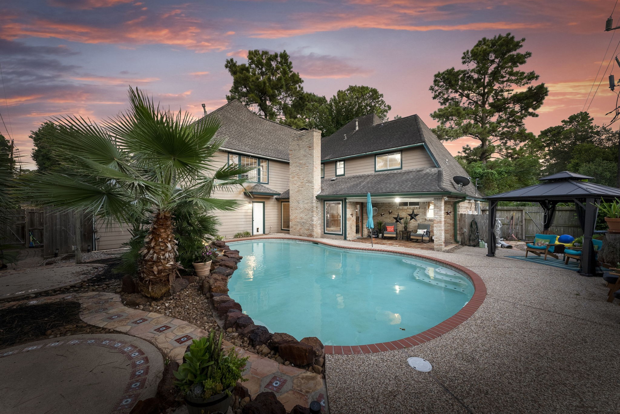 5718 Glenmere Lane Spring, TX 77379 - Photo 43 of 43 a view of a swimming pool with a patio