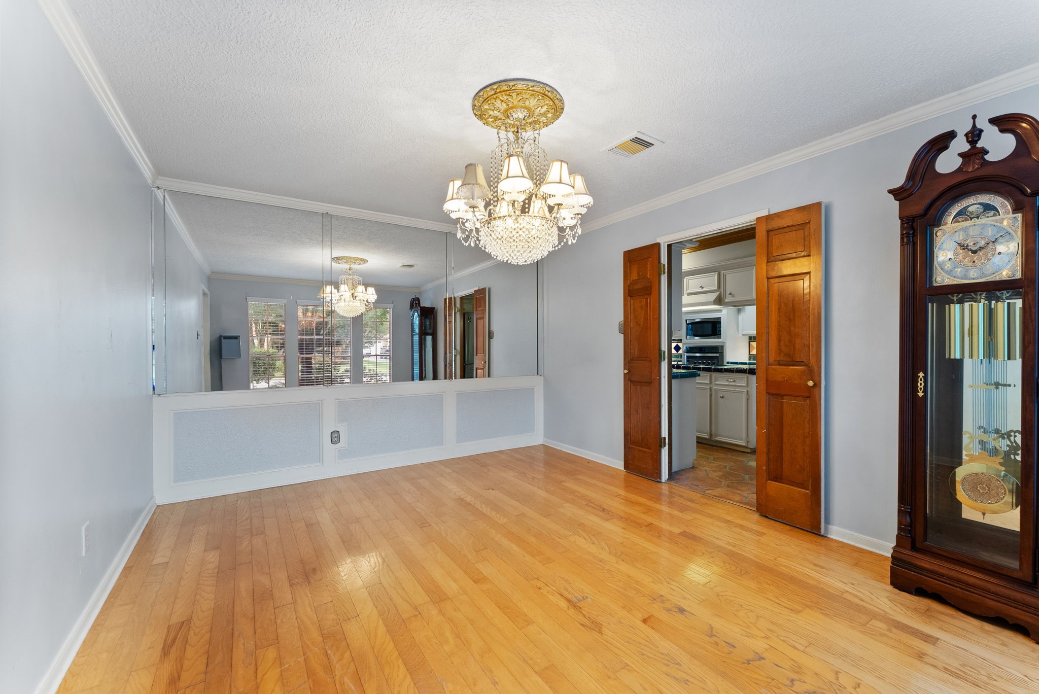 5718 Glenmere Lane Spring, TX 77379 - Photo 6 of 43 a view of livingroom with chandelier