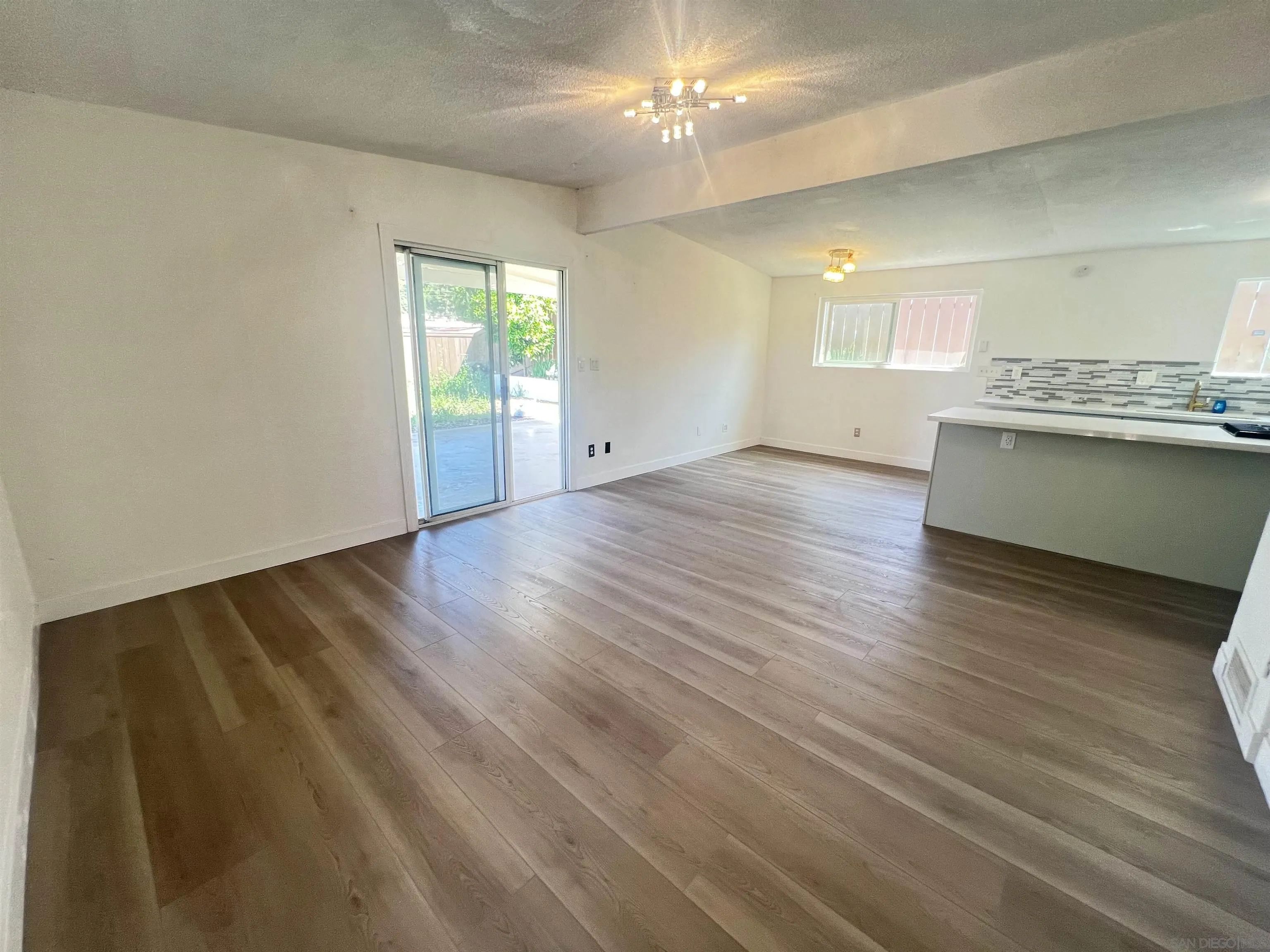 9267 Fairlawn Street Santee, CA 92071 - Photo 3 of 12 a view of an empty room with a window