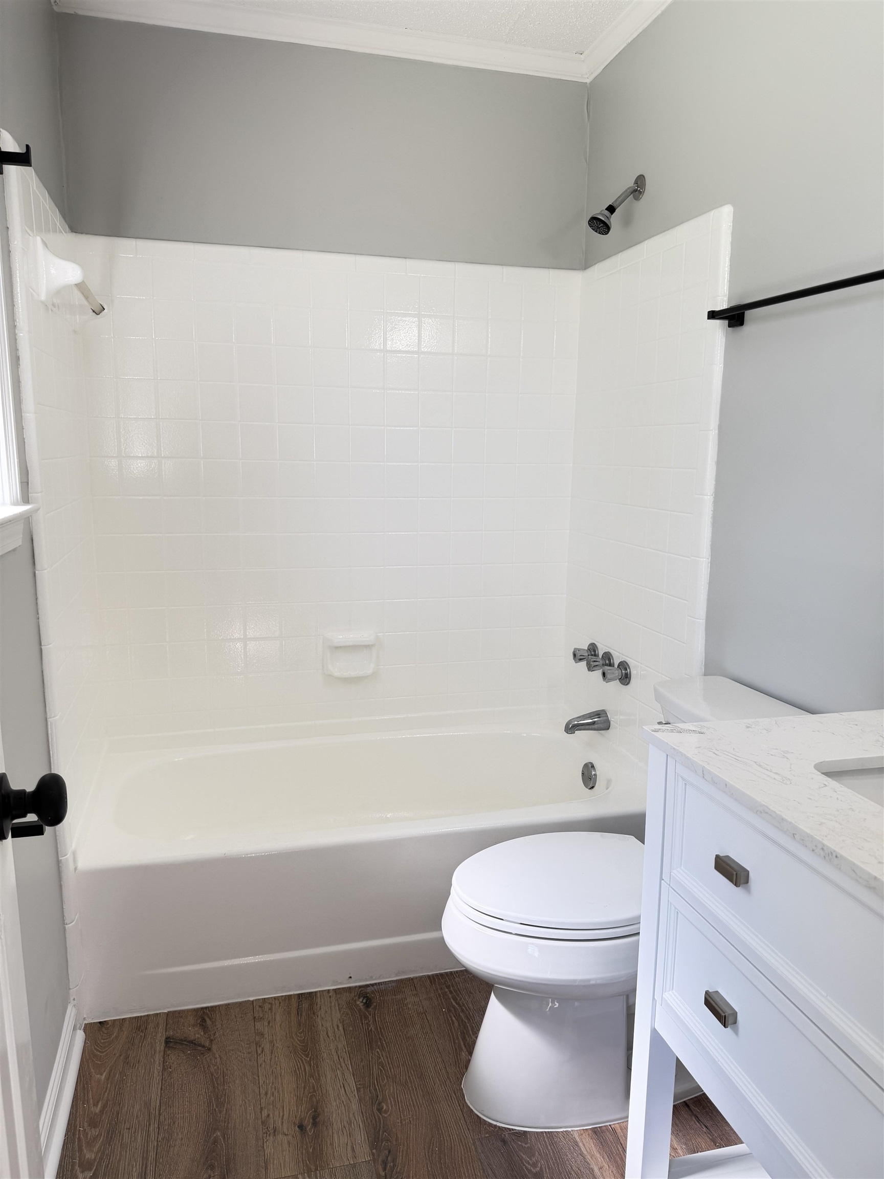 388 Park Hill Road Collierville, TN 38017 - Photo 15 of 19 Bathroom featuring a full white bathtub with subway tile surround and coordinating shower fixture