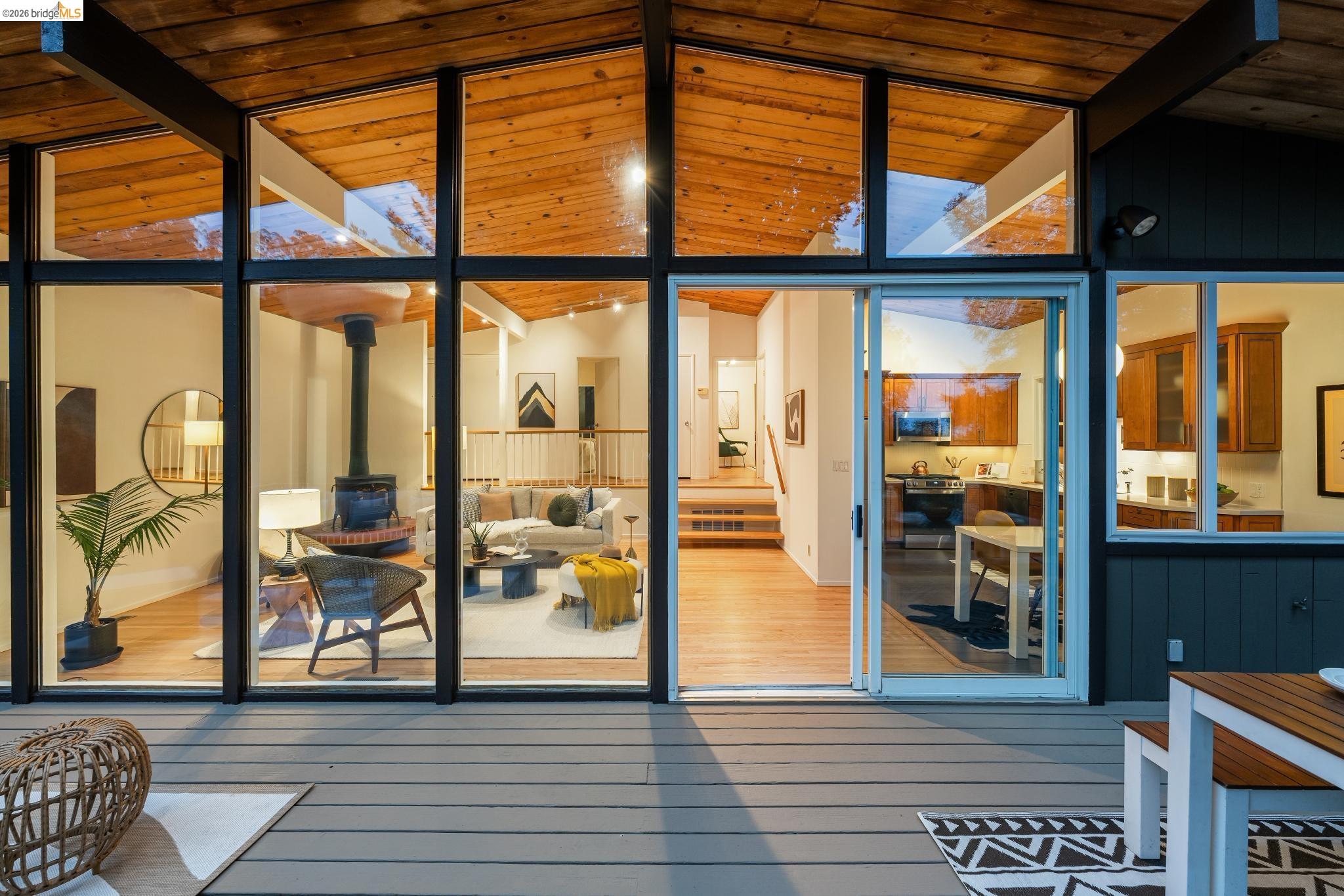 6645 Heather Ridge Way Oakland, CA 94611 - Photo 48 of 61 Expansive outdoor deck featuring composite decking and a sliding glass door entry to the interior