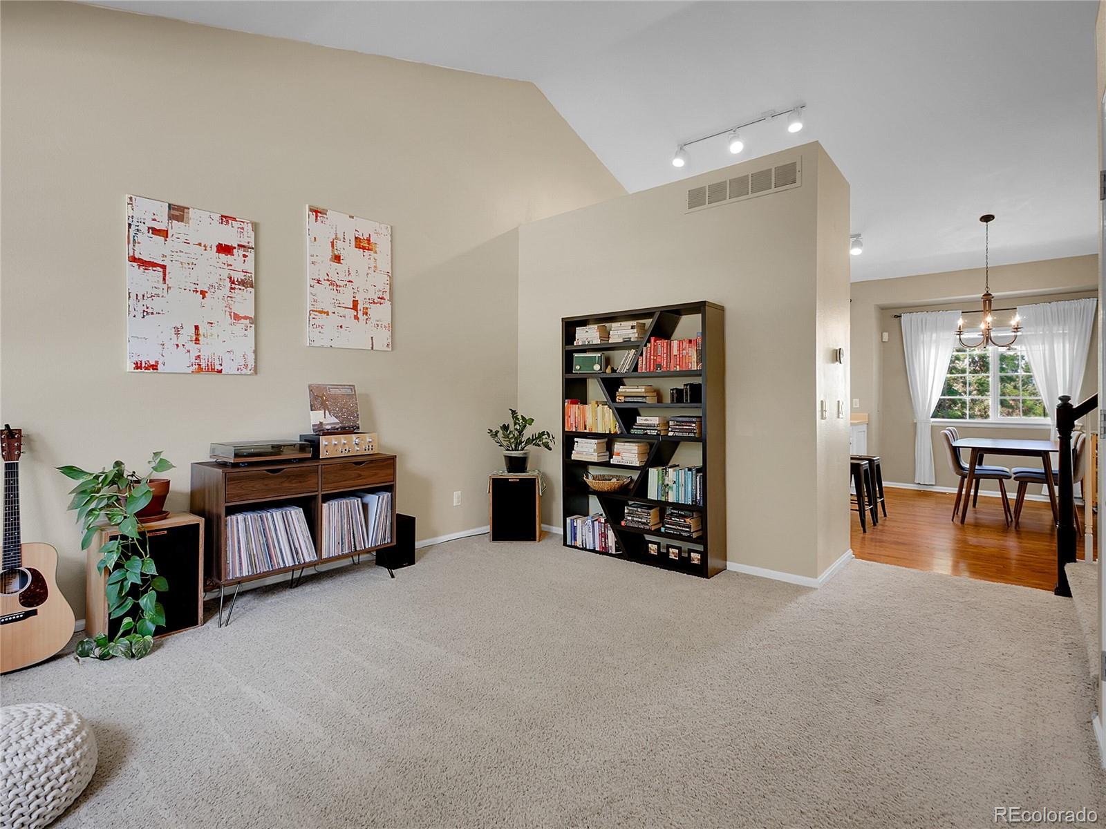 1234 Riddlewood Lane Highlands Ranch, CO 80129 - Photo 4 of 25 a view of a workspace with furniture and toys