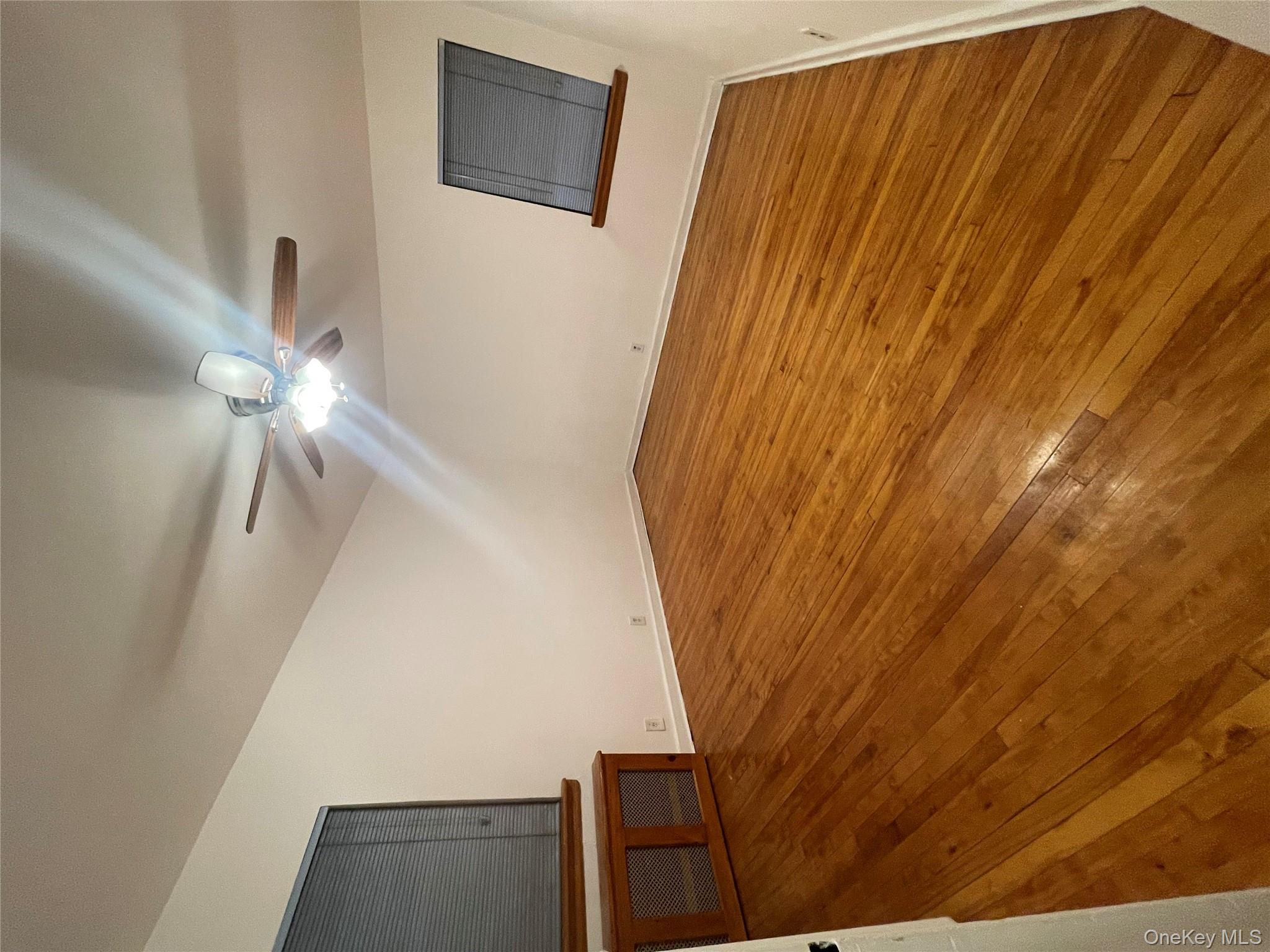 196-61 69th Avenue, Unit 1 Queens, NY 11365 - Photo 2 of 13 a view of an empty room