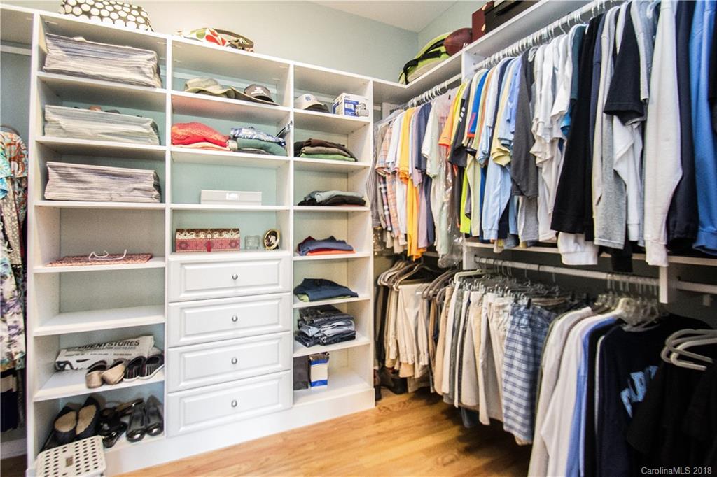 4016 Perth Road Indian Land, SC 29707 - Photo 15 of 28 a view of walk in closet with clothes and shoes