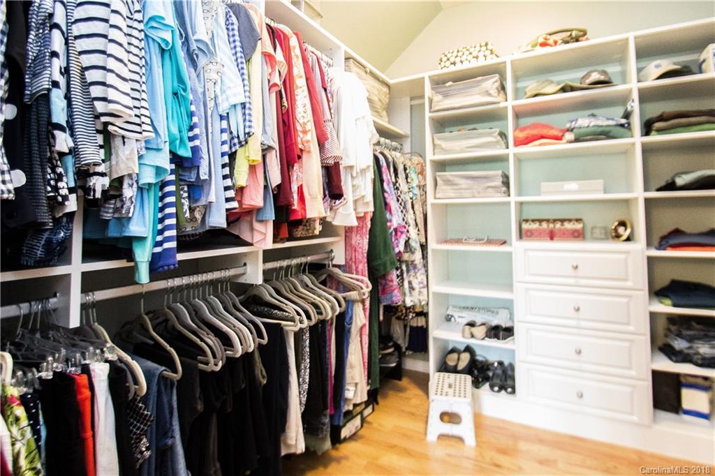 4016 Perth Road Indian Land, SC 29707 - Photo 16 of 28 a view of walk in closet with clothes and shoes