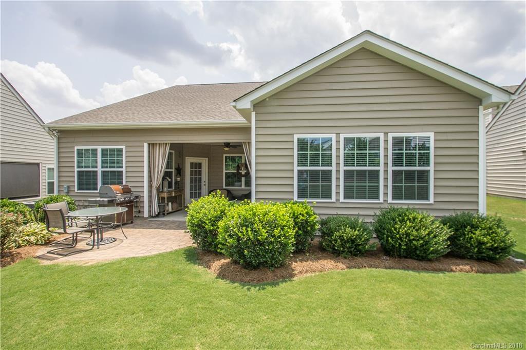 4016 Perth Road Indian Land, SC 29707 - Photo 22 of 28 a house with a garden and patio