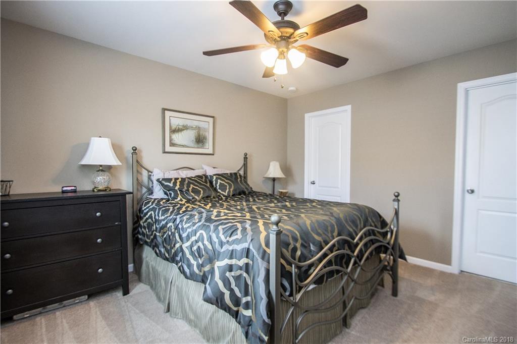 4016 Perth Road Indian Land, SC 29707 - Photo 23 of 28 a bed sitting in a bedroom and night stand