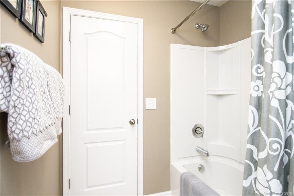 4016 Perth Road Indian Land, SC 29707 - Photo 26 of 28 a bathroom with a bathtub and shower