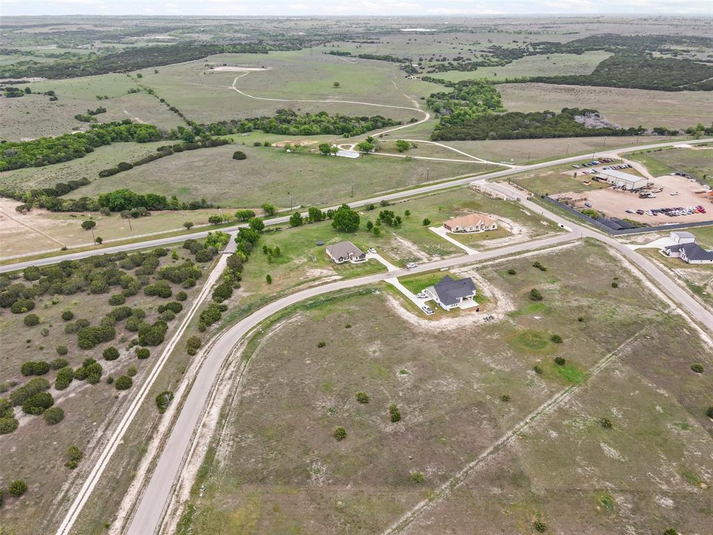 12833 Torello Court Godley, TX 76044 - Photo 3 of 14 an aerial view of a house with a ocean view