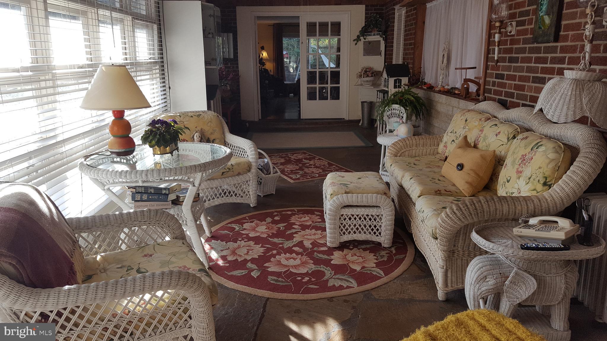 9908 Old Ardwick Ardmore Road Springdale, MD 20721 - Photo 3 of 24 Sun Room Entry