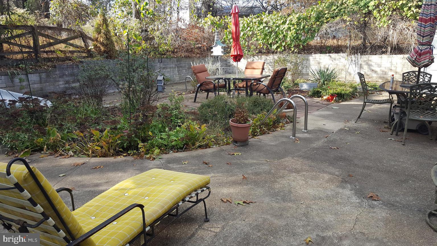 9908 Old Ardwick Ardmore Road Springdale, MD 20721 - Photo 8 of 24 Enclosed Patio/A Secret Garden