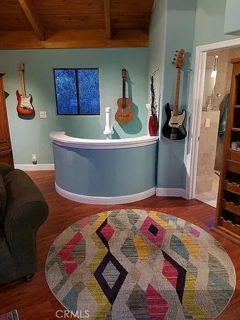 a room with furniture and a wooden floor