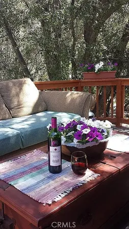 a view of a backyard with sitting area