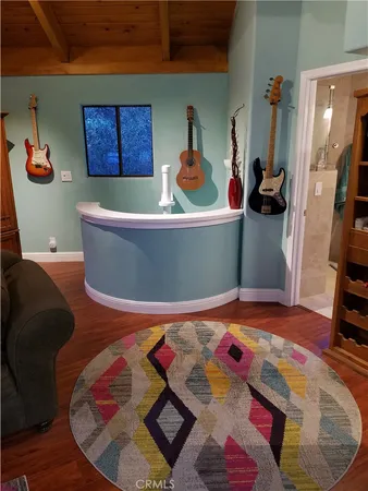 a room with furniture and a wooden floor