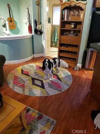 a room with furniture and wooden floor