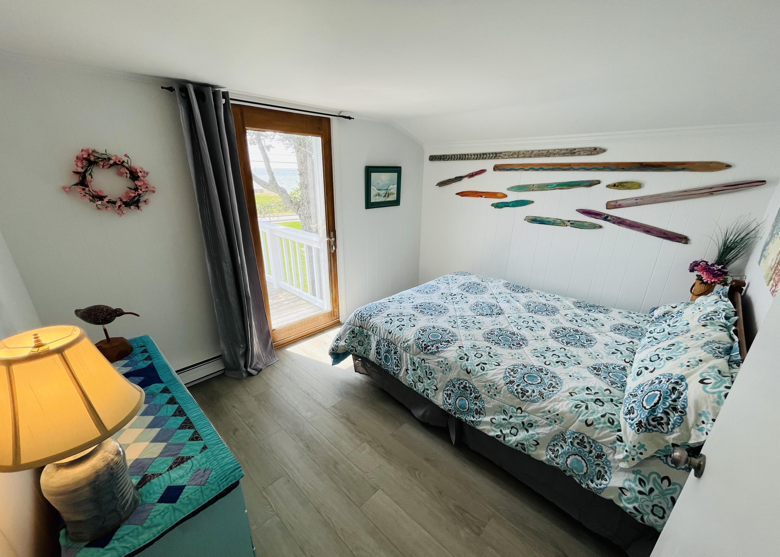 32 Shore Road West Yarmouth, MA 02673 - Photo 20 of 23 a bedroom with a bed and a window