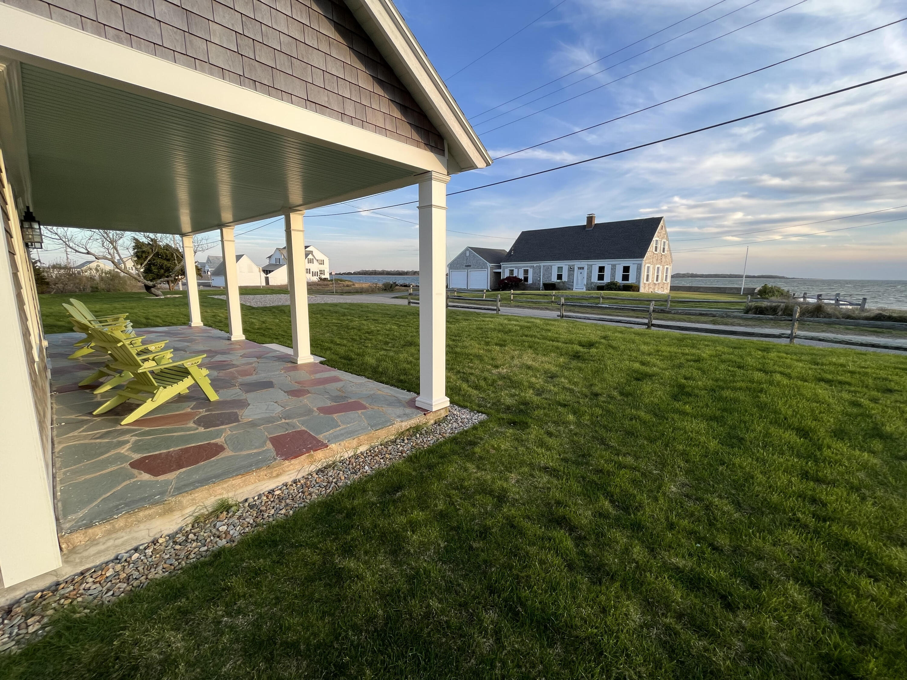 32 Shore Road West Yarmouth, MA 02673 - Photo 2 of 23 a view of a backyard