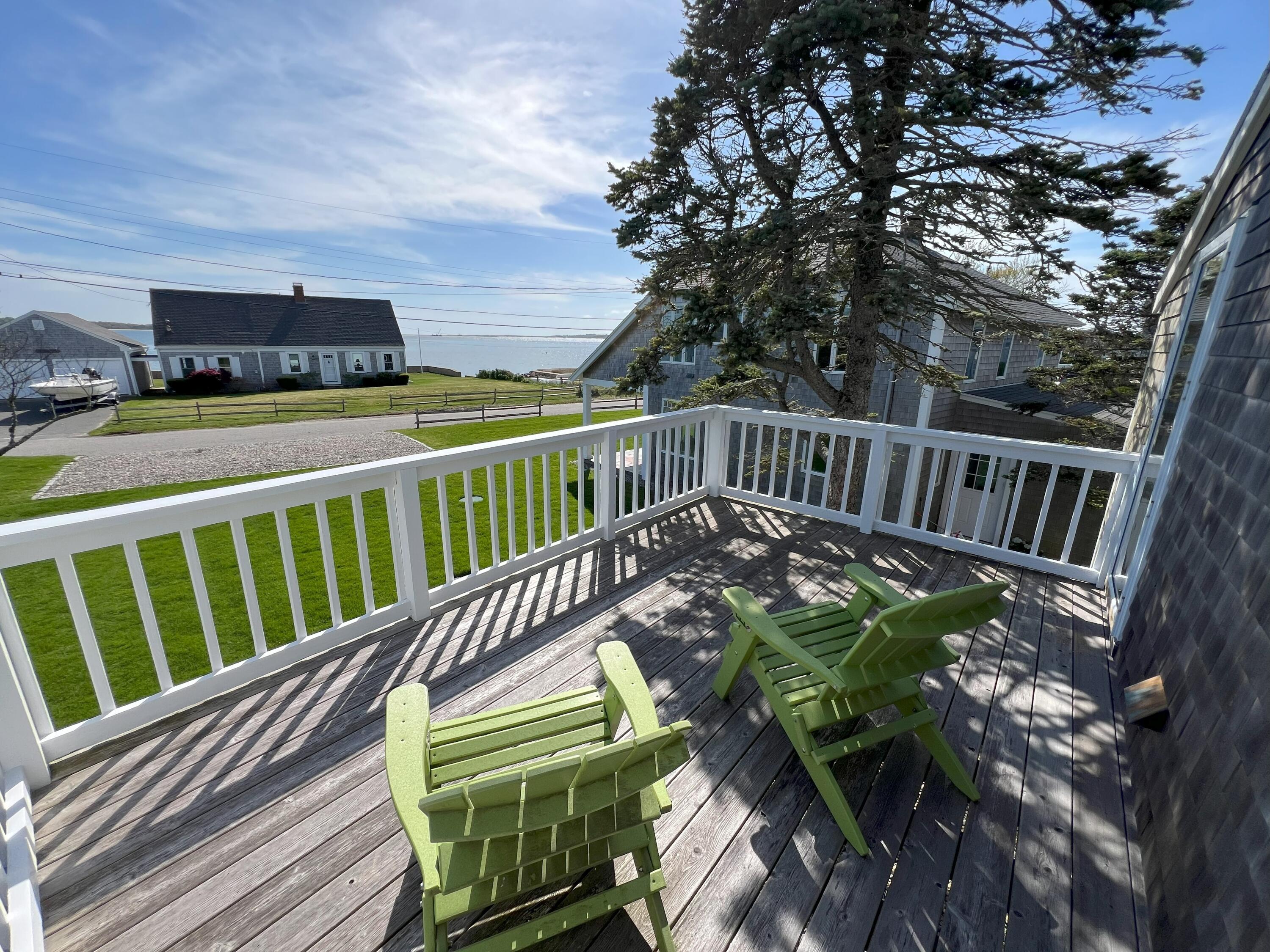 32 Shore Road West Yarmouth, MA 02673 - Photo 6 of 23 a view of balcony with deck and outdoor seating