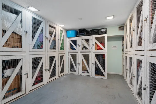 a view of an empty room with furniture