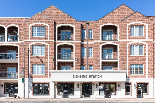 a front view of multi story residential apartment building