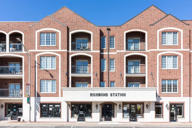a front view of multi story residential apartment building