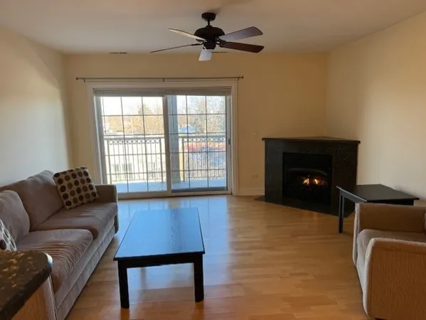 a spacious bedroom with a bed and a large window