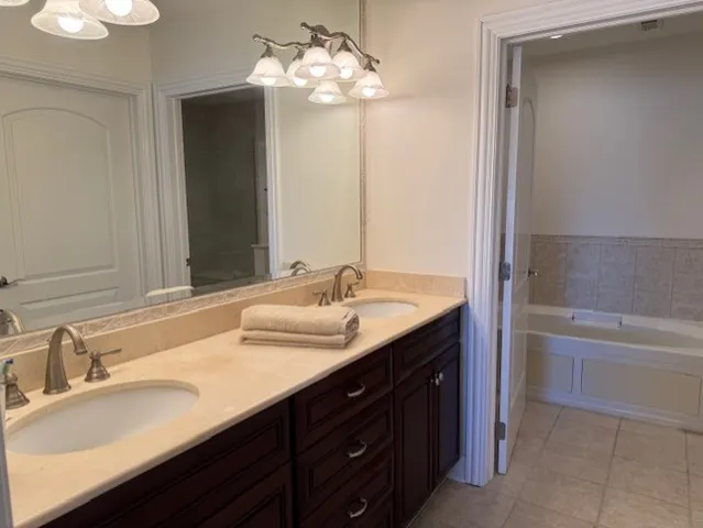 a bathroom with a bathtub and a toilet