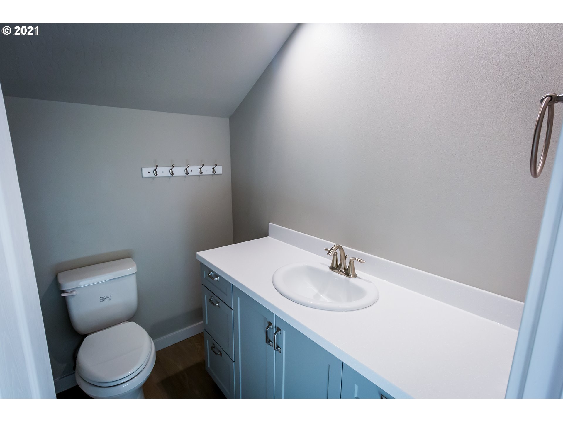 156 65th Place Springfield, OR 97478 - Photo 15 of 24 a bathroom with a sink toilet and mirror