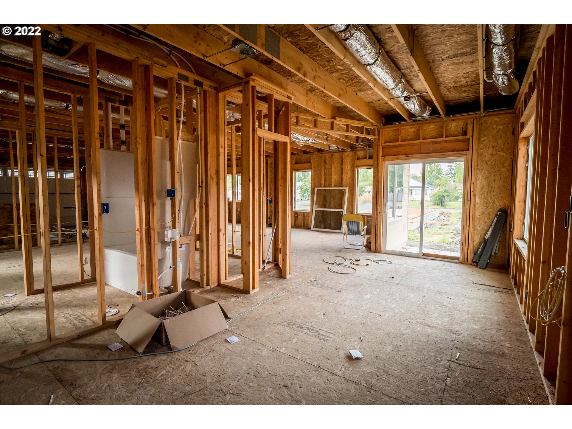 156 65th Place Springfield, OR 97478 - Photo 21 of 24 a view of a room with wooden floor and windows